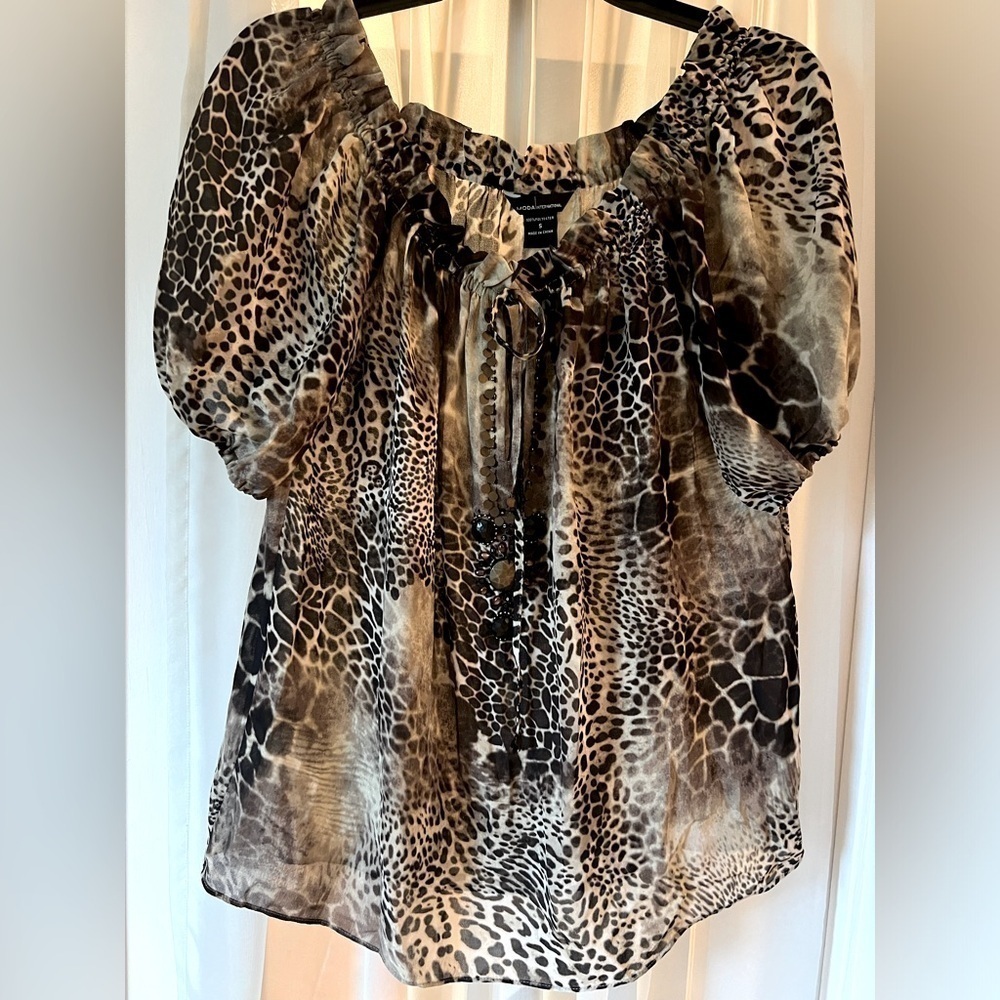 Moda International brand woman’s short sleeve top. Leopard print. Size S.